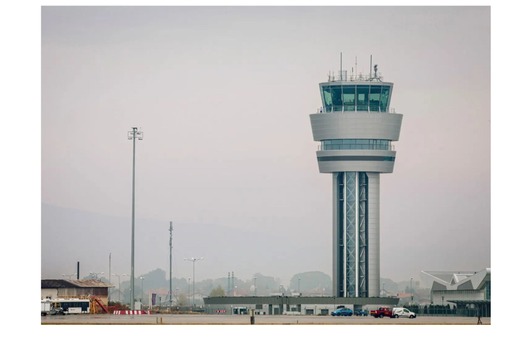 A close-up of a paper filter filled with ground coffee